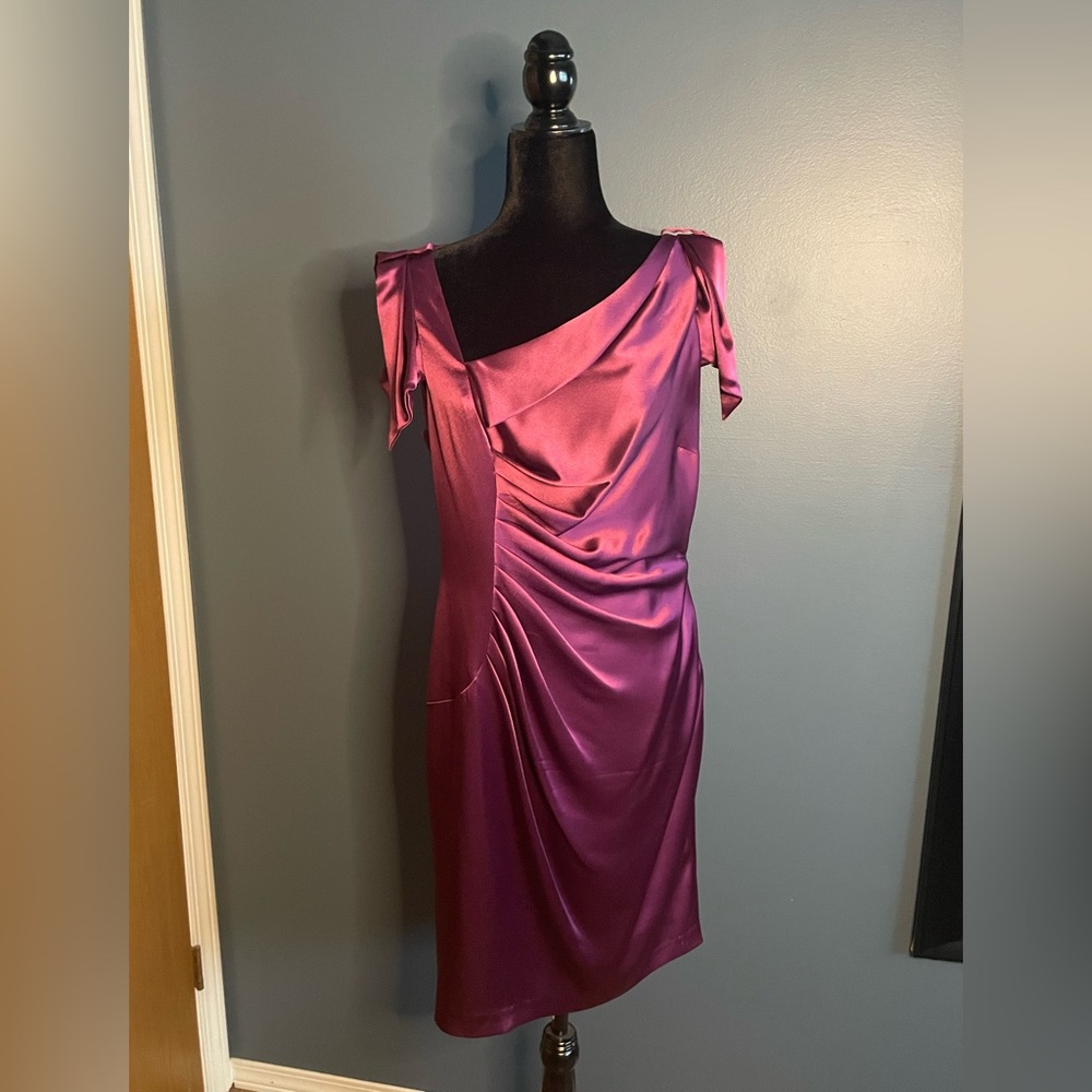 This pretty plum piece has a shiny satin- like sheen!